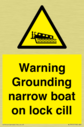 warning-grounding-narrow-boat-on-lock-cill~