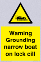 warning-grounding-narrow-boat-on-lock-cill~