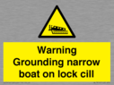 warning-grounding-narrow-boat-on-lock-cill~