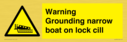 warning-grounding-narrow-boat-on-lock-cill~