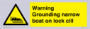 warning-grounding-narrow-boat-on-lock-cill~