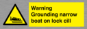 warning-grounding-narrow-boat-on-lock-cill~
