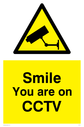 smile-you-are-on-cctv-sign-~