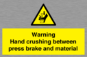 warning-hand-crushing-between-press-brake-and-material~
