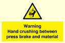 warning-hand-crushing-between-press-brake-and-material~