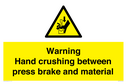 warning-hand-crushing-between-press-brake-and-material~