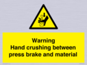 warning-hand-crushing-between-press-brake-and-material~