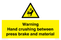 warning-hand-crushing-between-press-brake-and-material~