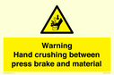 warning-hand-crushing-between-press-brake-and-material~