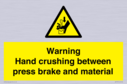 warning-hand-crushing-between-press-brake-and-material~