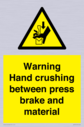 warning-hand-crushing-between-press-brake-and-material~