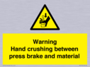 warning-hand-crushing-between-press-brake-and-material~