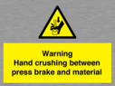 warning-hand-crushing-between-press-brake-and-material~