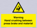 warning-hand-crushing-between-press-brake-and-material~