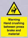 warning-hand-crushing-between-press-brake-and-material~