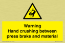 warning-hand-crushing-between-press-brake-and-material~