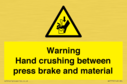warning-hand-crushing-between-press-brake-and-material~