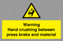 warning-hand-crushing-between-press-brake-and-material~