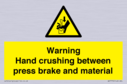 warning-hand-crushing-between-press-brake-and-material~