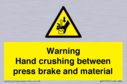 warning-hand-crushing-between-press-brake-and-material~
