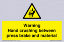 warning-hand-crushing-between-press-brake-and-material~