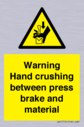 warning-hand-crushing-between-press-brake-and-material~