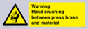 warning-hand-crushing-between-press-brake-and-material~