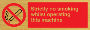 strictly no smoking whilst operating this machine - safety sign