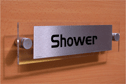 architectural--shower-door-sign-with-brushed-metal-finish--background-text-in-po~