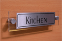 architectural--kitchen-door-sign-with-brushed-metal-finish--background-text-in-p~